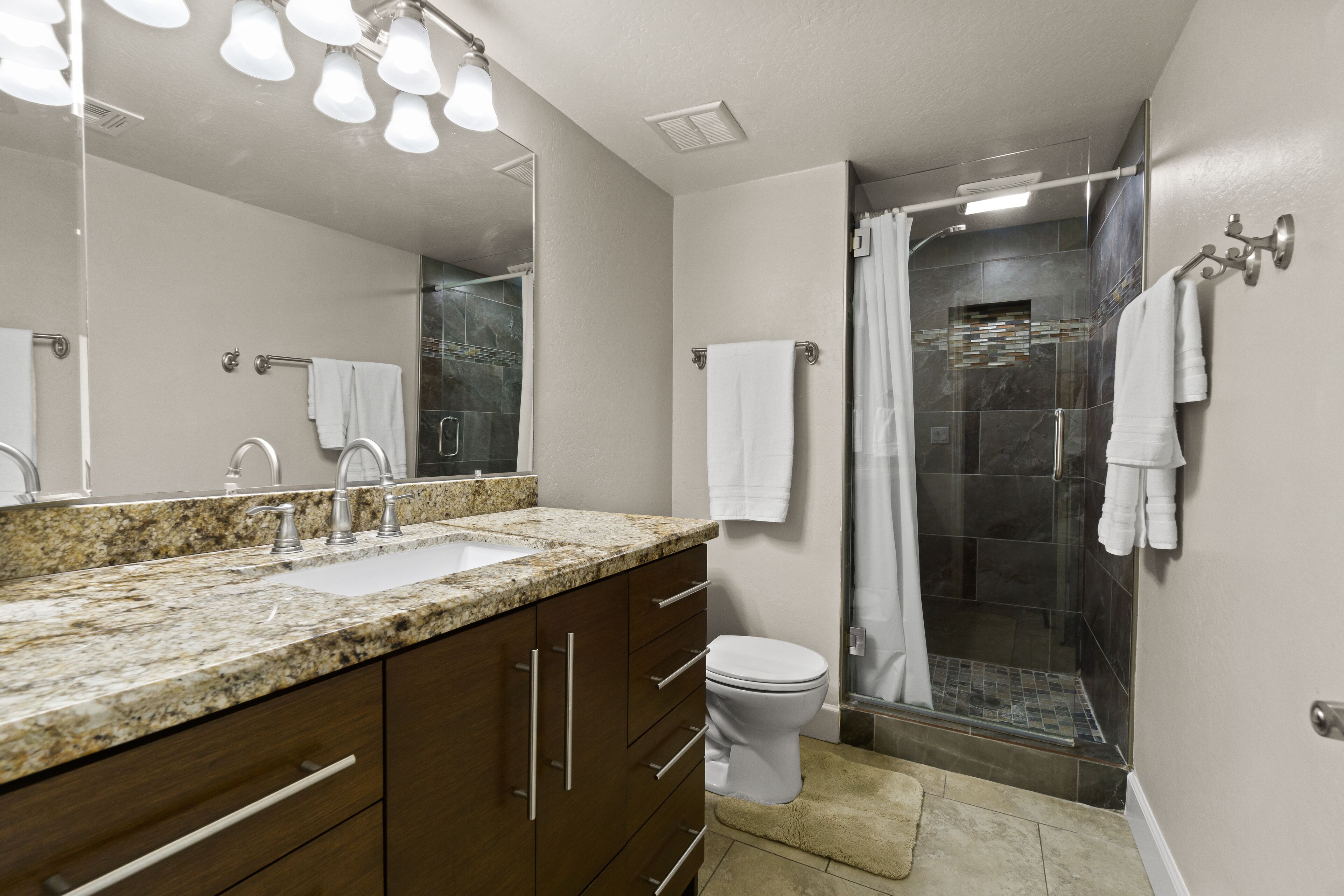 Shower, eco-friendly toiletries, hair dryer, towels