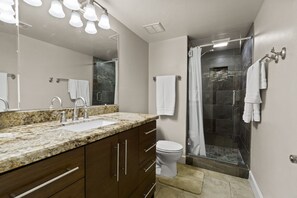 Shower, eco-friendly toiletries, hair dryer, towels