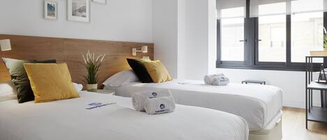 2 dormitorios, tabla de planchar con plancha, wifi gratis y ropa de cama