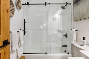 Hair dryer, towels, soap, shampoo