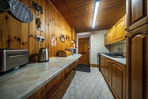 Fridge, oven, stovetop, dining tables