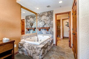 Shower, hair dryer, soap, toilet paper