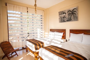 Economy Room | Free WiFi, bed sheets - Hotel Santa Cruz Punta Zicatela (Puerto Escondido)