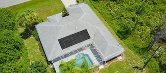 Single family pool home in a quiet neighborhood, close to five beaches,