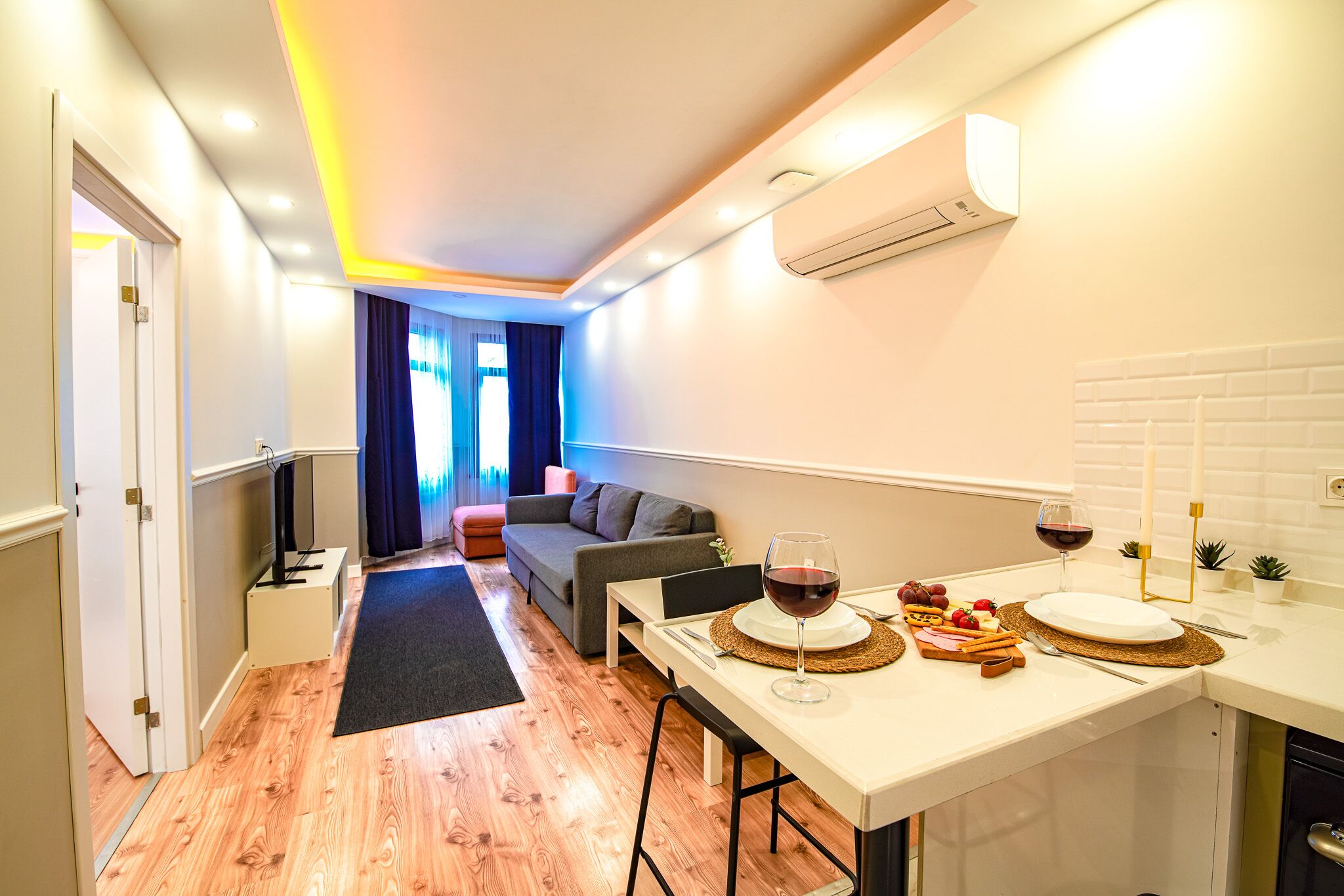Deluxe Condo | Living area | 104-cm Smart TV with digital channels, TV