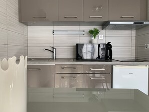 Fridge, microwave, coffee/tea maker, electric kettle