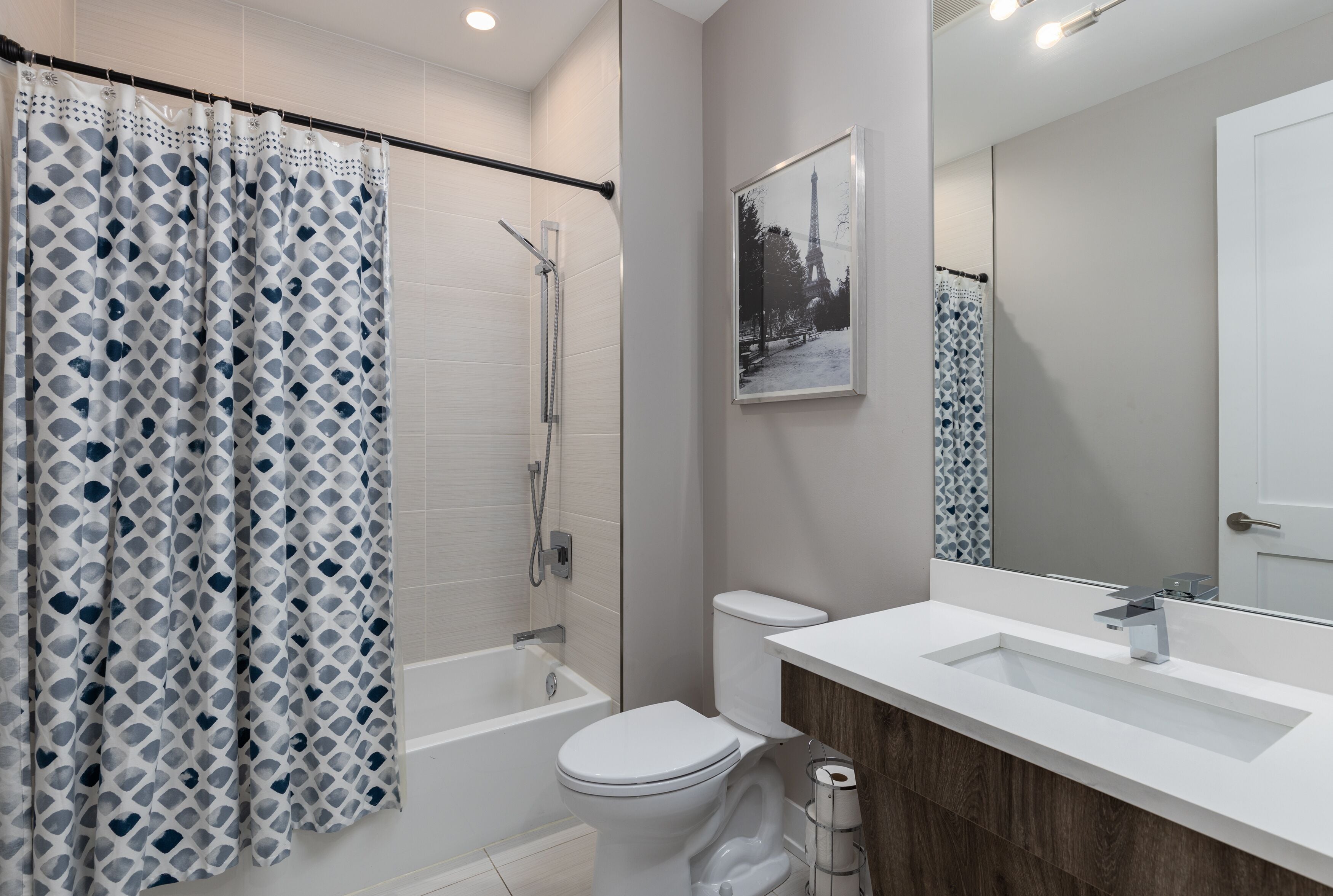 Shower, hair dryer, towels, shampoo