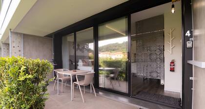 Lower-level Studio w/ kitchenett and patio