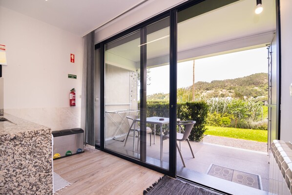 Interior - Lower level Studio w/ kitchenett and patio (Santana)
