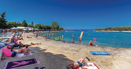 Beach front apartment in Punat with sauna