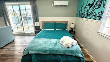 1 dormitorio, tabla de planchar con plancha, wifi y ropa de cama