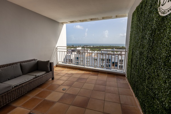Relax and enjoy the breeze and view from the covered rooftop.