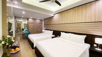 Family Quadruple Room | Premium bedding, minibar, in-room safe, individually decorated