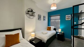 Desk, iron/ironing board, travel cot, free WiFi