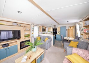 Living area - Stylish with a touch of luxury 12ft-wide caravan with one double and two twins. (Penhallow)
