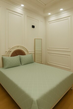A bedroom with a bed, two pillows, a nightstand, a mirror, and a dresser. - Sun-drenched Days and Relaxing Nights Porto Said (Al-Manasrah)