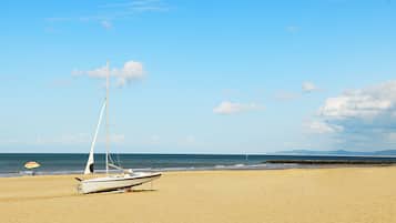 On the beach, white sand