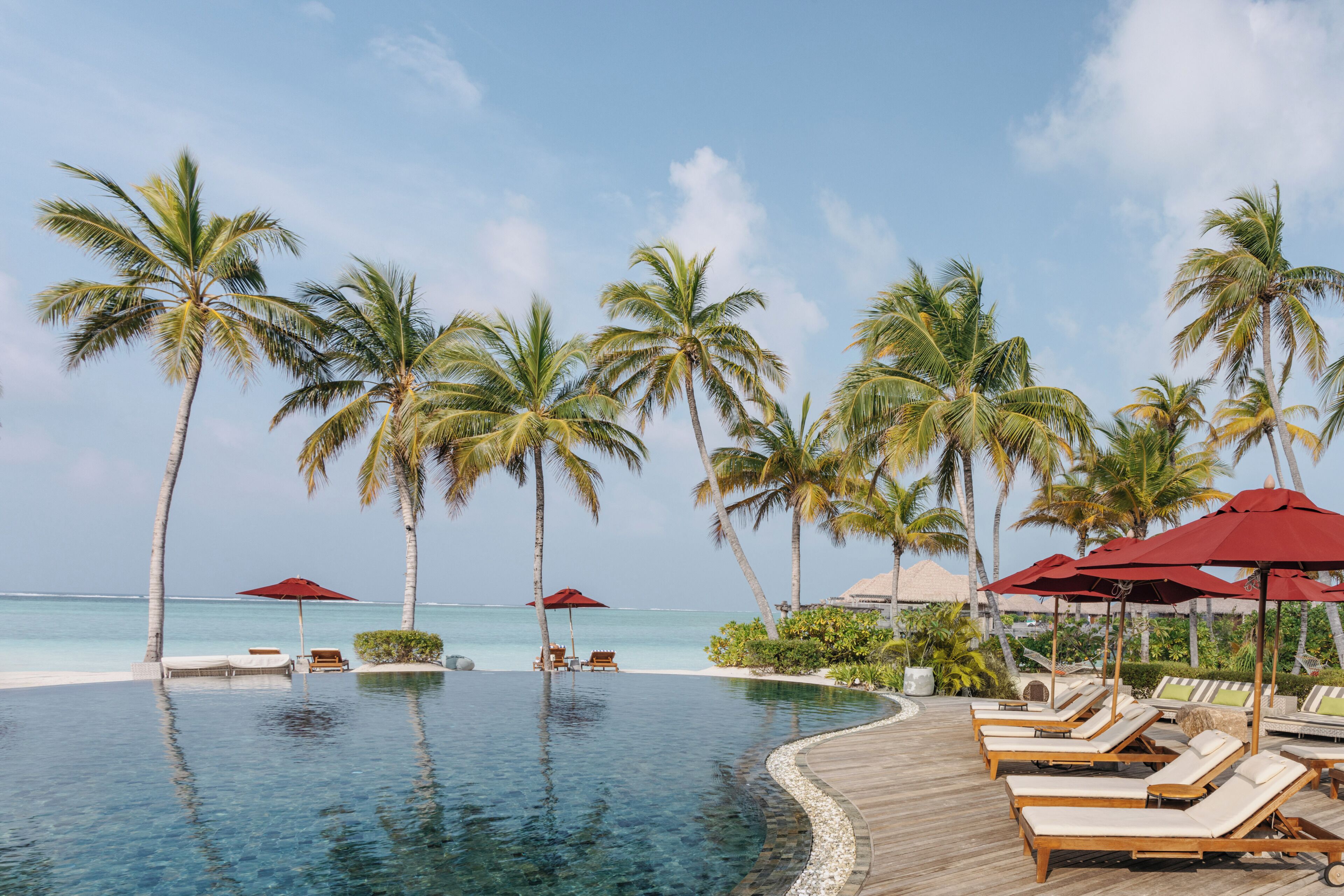 Outdoor pool, free cabanas, pool umbrellas