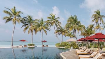 Outdoor pool, free cabanas, pool umbrellas