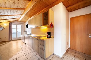 Fridge, stovetop, coffee/tea maker, electric kettle