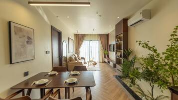Deluxe Penthouse, 2 Bedrooms | Living area | 43-inch Smart TV with digital channels, TV, Netflix