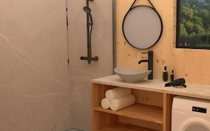 Shower, eco-friendly toiletries, towels