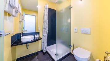 Shower, bathrobes, towels, soap