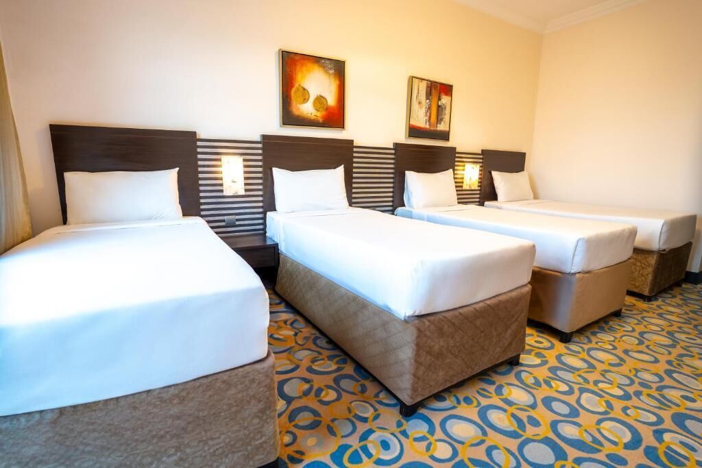 Superior Room, Multiple Beds | Minibar, in-room safe, desk, soundproofing