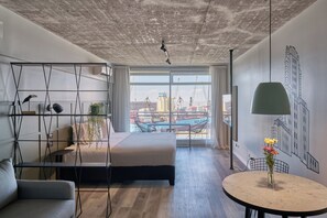 Standard Room, River View | In-room safe, desk, iron/ironing board, free cribs/infant beds