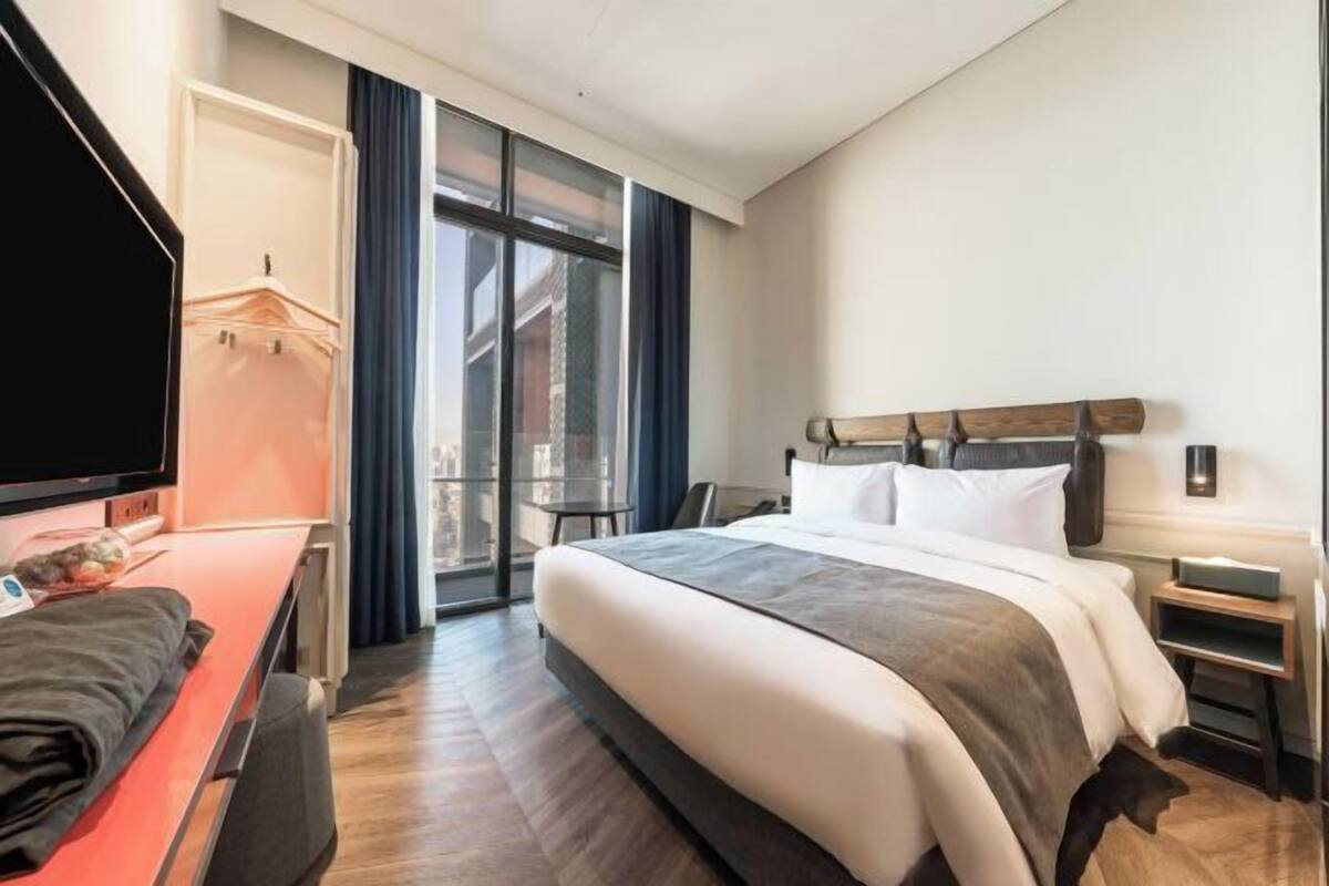 Premium bedding, down comforters, in-room safe, laptop workspace
