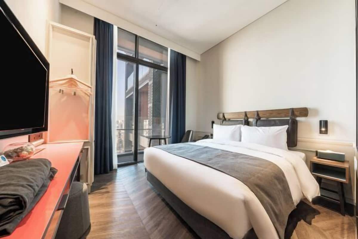 Premium bedding, down comforters, in-room safe, laptop workspace