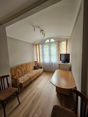 Basic Room | Living area | 40-inch LED TV with digital channels, TV - Hotel Elīna (Jurmala)