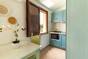 Fridge, stovetop, cookware/dishes/utensils