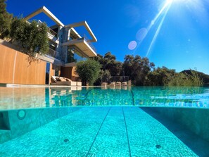 Outdoor pool, a heated pool - Luxury Villa Feroula (Pentati)