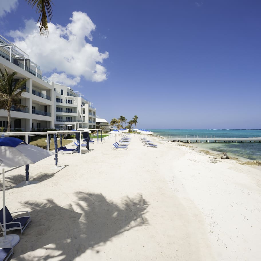 On the beach, sun loungers, beach umbrellas, beach towels