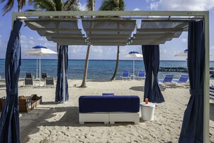 On the beach, sun loungers, beach umbrellas, beach towels