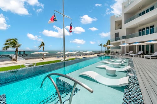 Outdoor pool, pool umbrellas, sun loungers