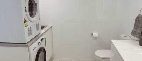 Shower, hair dryer, towels