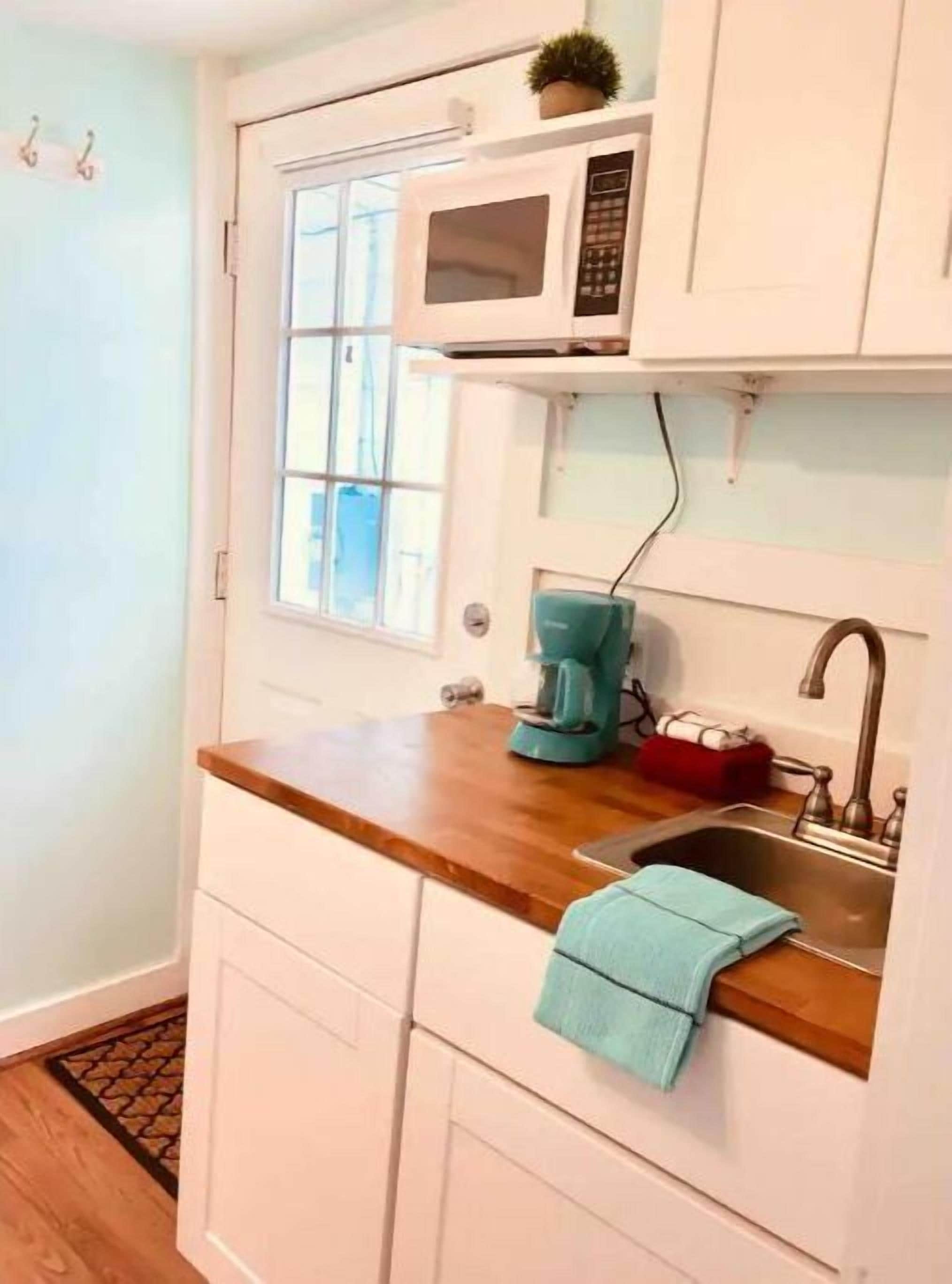 Fridge, microwave, coffee/tea maker, toaster