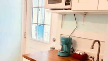 Fridge, microwave, coffee/tea maker, toaster