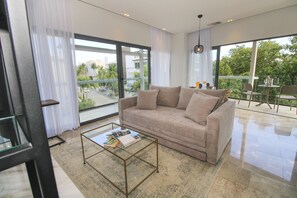 Presidential Suite, City View | Living area | 42-inch LCD TV with cable channels, TV, Netflix