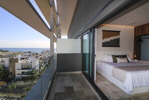 Suite Luxe, vue partielle sur l'océan | Literie de qualité supérieure, coffres-forts dans les chambres