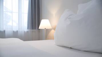 Premium bedding, down comforters, in-room safe, desk