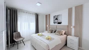 Deluxe Apartment, 2 Bedrooms, Courtyard View, Ground Floor | Premium bedding, pillowtop beds, desk, soundproofing
