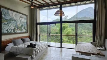 Deluxe-Zimmer | Wohnbereich | Bücher