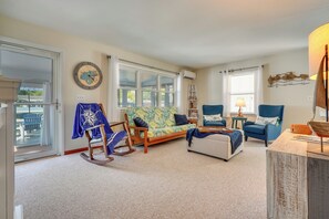 TV, fireplace, books