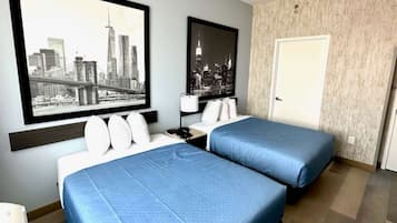 In-room safe, iron/ironing board, WiFi (free), bed sheets