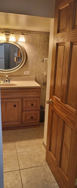 Shower, towels, soap, toilet paper