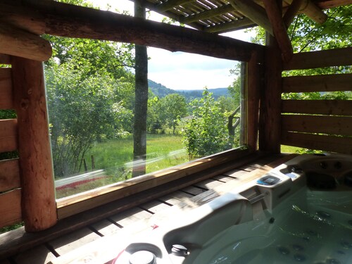 Unusual, secluded log cabin in the Vosges with luxury spa