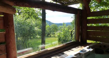 Unusual, secluded log cabin in the Vosges with luxury spa